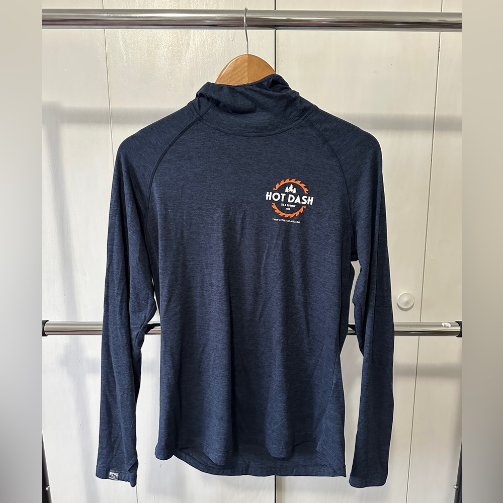 Storm Creek women’s running long sleeve shirt with hood.